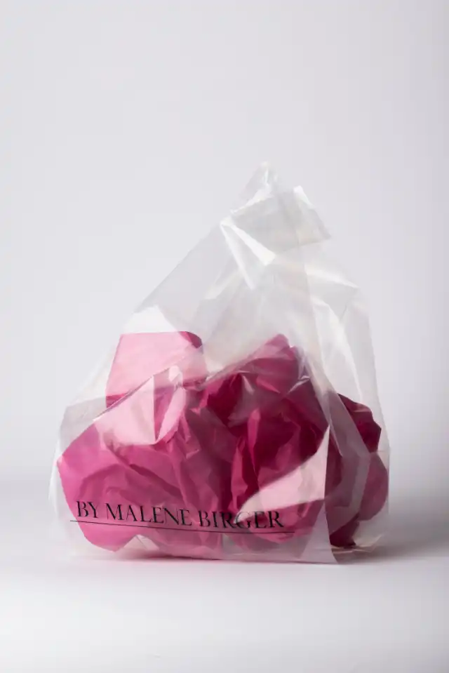 Läpinäkyvä muovikassi